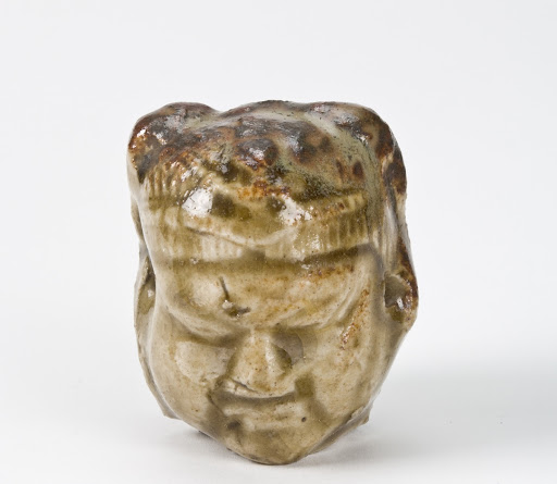 Whistle in the shape of a warrior head