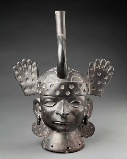 Sculptural ceramic ceremonial vessel that represents the head of a priest ML013563 - Moche style