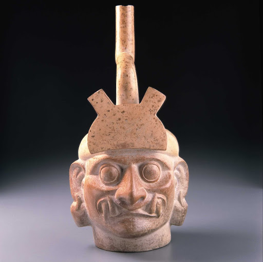 Sculptural ceramic ceremonial vessel that represents the head of Ai Apaec,  mythological hero of the Moche in the upper world ML003022 - Moche style