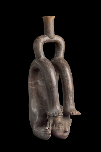Stirrup-spout vessel representing a man in a contorted position - Cupisnique style
