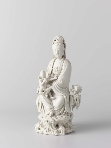 Figure of a seated Guanyin with child - He Chaozong