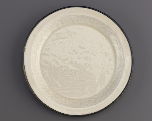 Ding ware dish with molded decoration of mandarin ducks