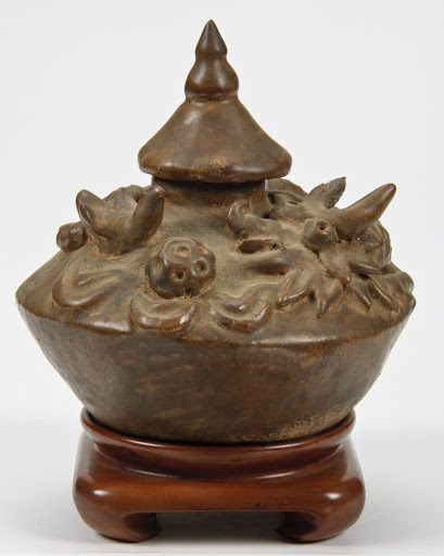 Pot with lid and applied dragons