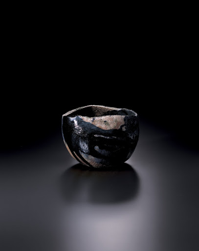 Black Raku Tea Bowl, yakinuki type, called BOKOROSUI - Raku Kichizaemon