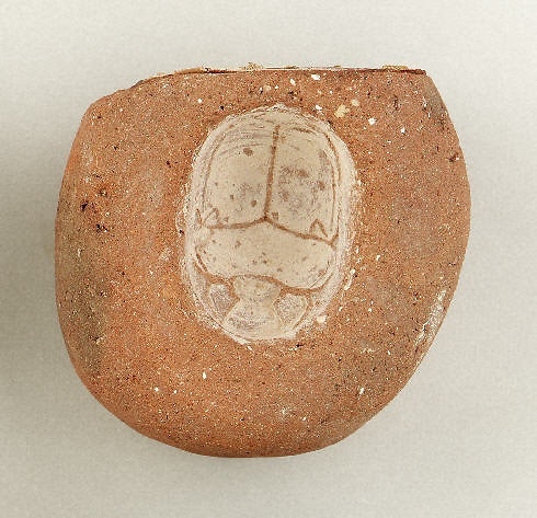 Impression of a scarab beetle, possibly a mold