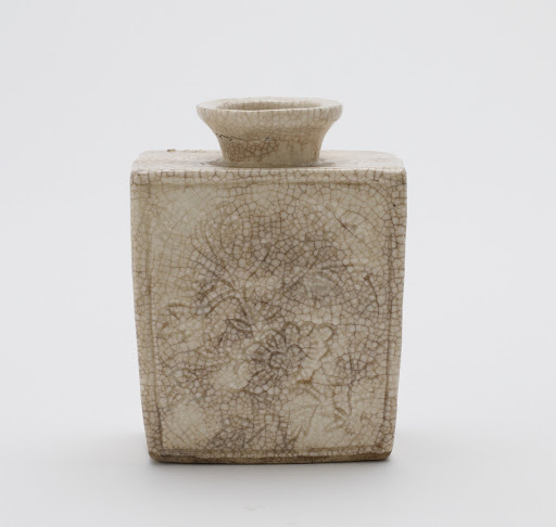 Vase with molded decor of floral sprays