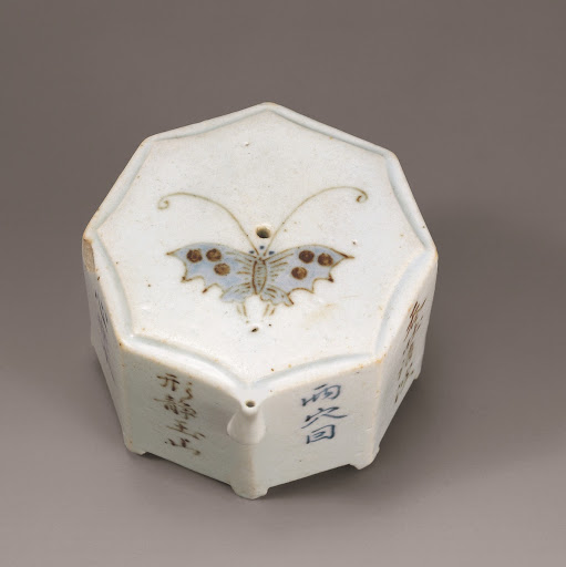 White Porcelain Octagonal Water Dropper with Butterfly Design and Inscription of a Poem in Underglaze Cobalt Blue and Iron - Unknown