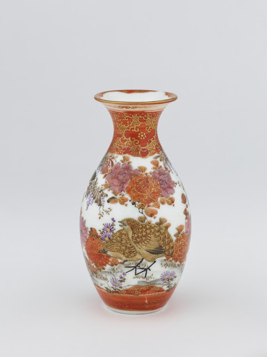 Kutani ware bottle with design of asters, chrysanthemums, peonies, wisteria and quail