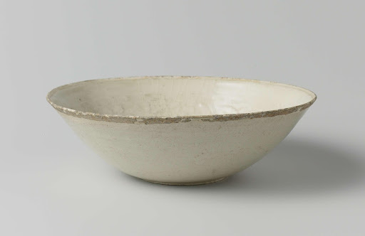 Bowl with lotus flowers, feng huangs and floral scrolls in relief - Anonymous