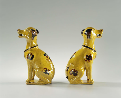 Figure of a seated dog with spots and collar - Anonymous,