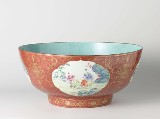 Straigh-sided bowl with playing boys in shaped panels on a red ground with floral scrolls - Anonymous