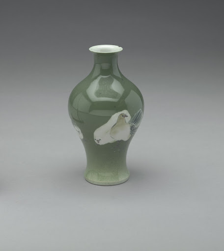 Vase with design of doves and green glaze