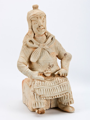 Figure of a seated soldier