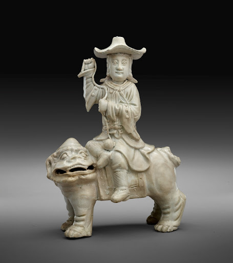 Western Man on Guardian Lion - Chinese