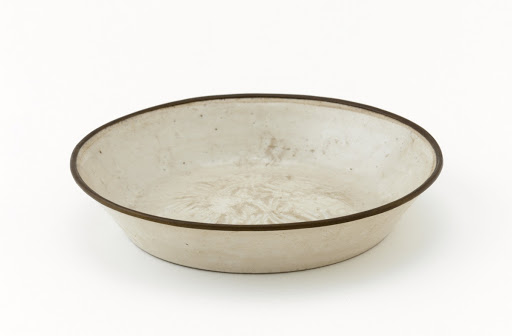 Dish with molded decor