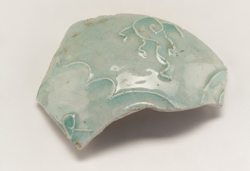 Curved fragment from body of vase or jar