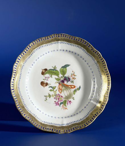 Lobed plate with fruit and flower sprays and ornamental borders - Anonymous