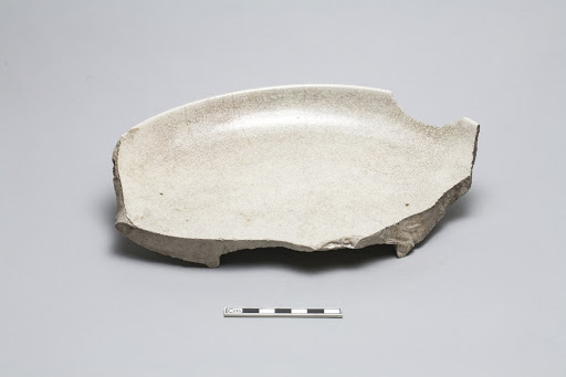 Fragment of large heavy undecorated plate