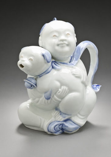 Sake Vessel of a Chinese Child Holding a Puppy - Unknown