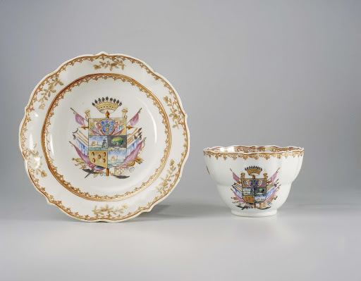 Cup with handle and saucer with a coat of arms, flower sprays and spearhead-borders - Anonymous