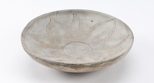 Dish with incised lotus design