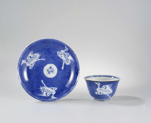 Cup and saucer with powder blue and cranes - Anonymous