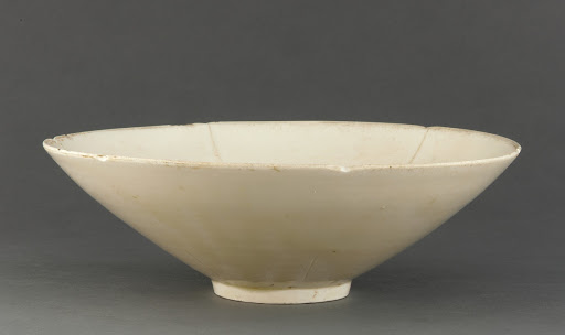 Ding ware bowl with molded lotus design in bottom
