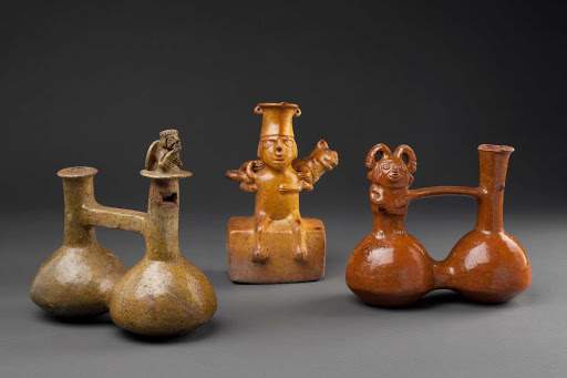 Whistling ceramic vessel that represents a lord carrying a captive puma (center) ML017536 - Inca-Colonial style