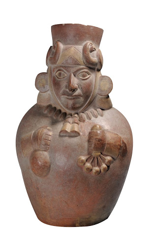 Large jar in the form of man with fancy headdress - unknown