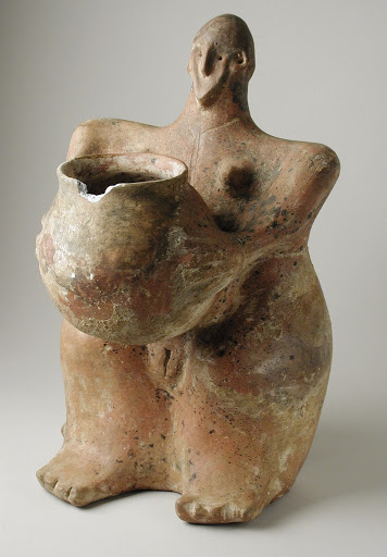 Female Figurine Holding Jar - Unknown