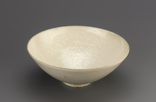Ding ware bowl with molded deesign of lotus