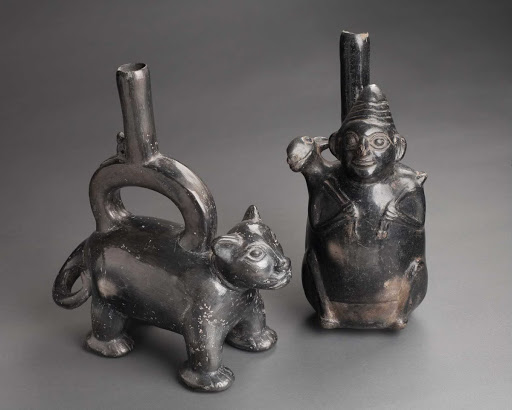 Sculptural ceramic ceremonial vessel that represents a feline (left) ML031846 - Chimu style