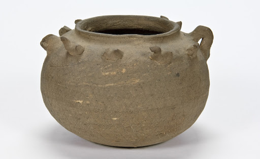 Pot with applied figures of birds