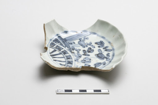 Fluted plate, base and rim fragment
