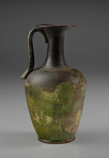 BOTTLE WITH HANDLE, Stoneware with green glaze - unknown