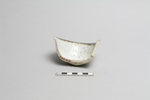 Small cup, fragment of wall and rim