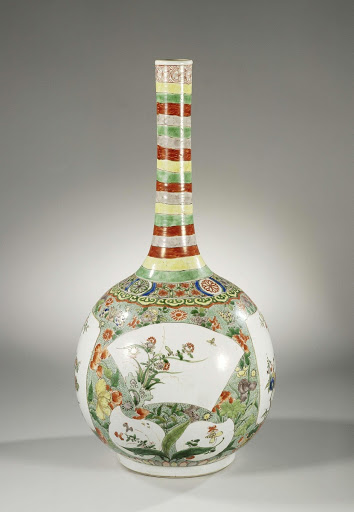 Bottle vase with flower sprays in cartouches in reserve on a speckled green ground - Anonymous