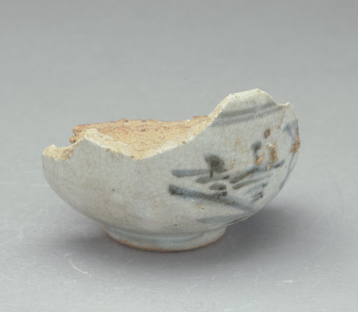 Bowl (waster) with piece of saggar