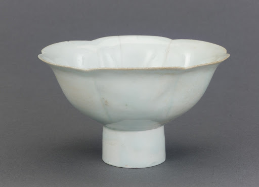 Bowl with foliate rim and tall foot