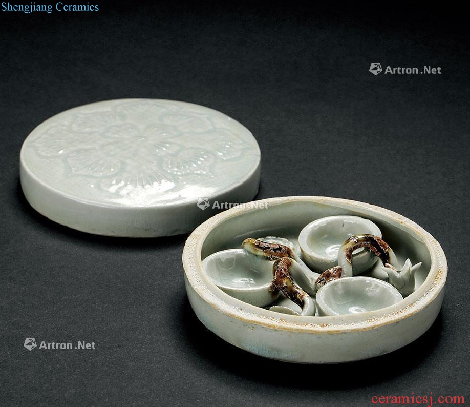 The 11 th Century A CELADON LOTUS PATERNED BOX WITH COVER