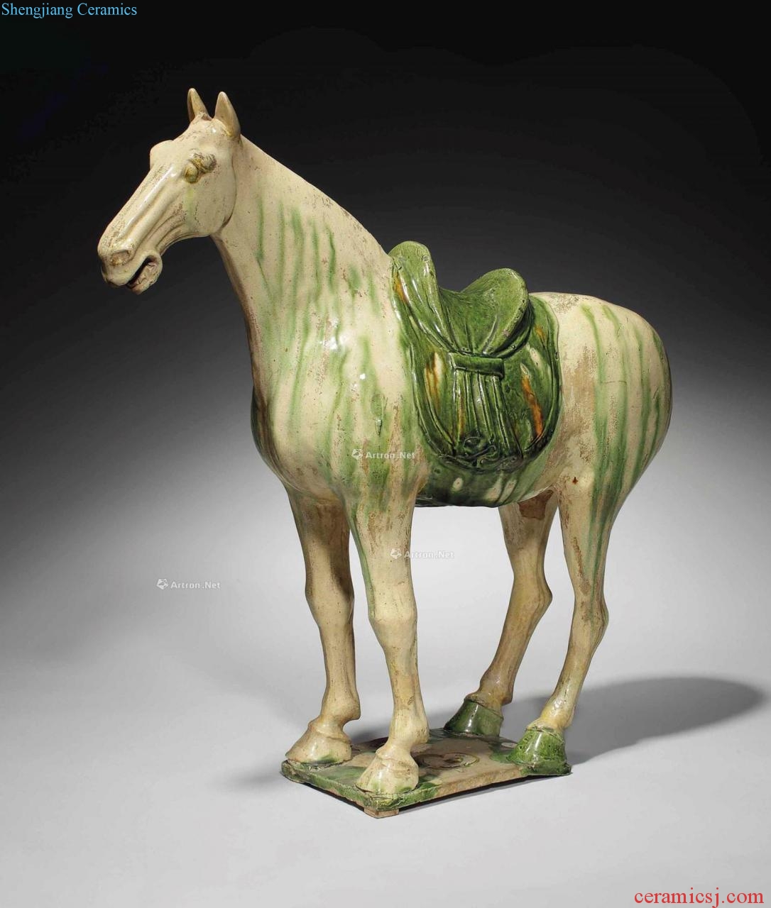 The tang dynasty (618-907), A LARGE SANCAI - GLAZED POTTERY FIGURE OF A HORSE