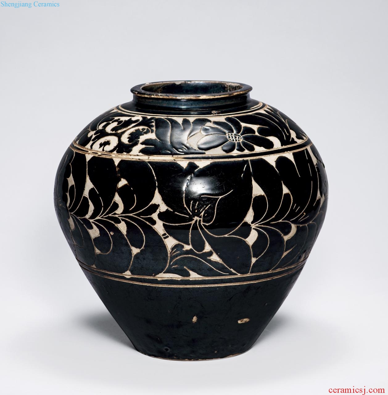 Gold/yuan (1115-1368), the black glaze carved flower peony grains cans