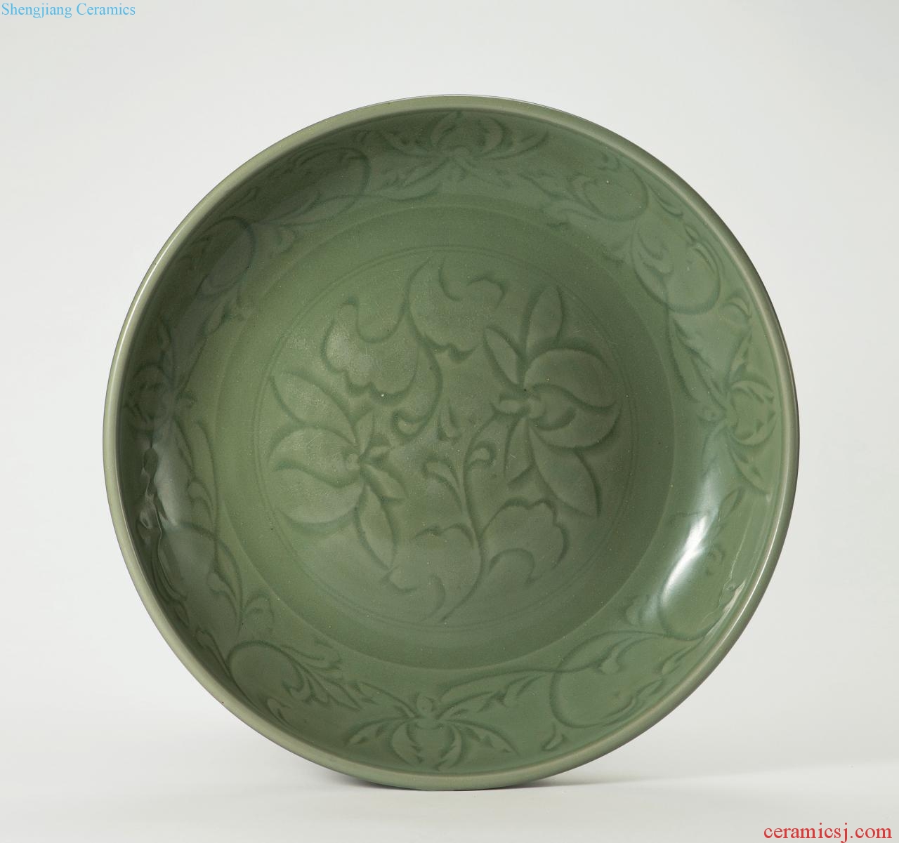 The beginning of the yuan/Ming Longquan celadon green glazed carved flower tray