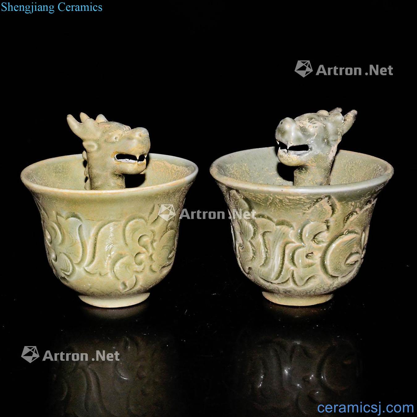The song dynasty Yao state kiln carved flower mold carved dragon post back a cup of (a)