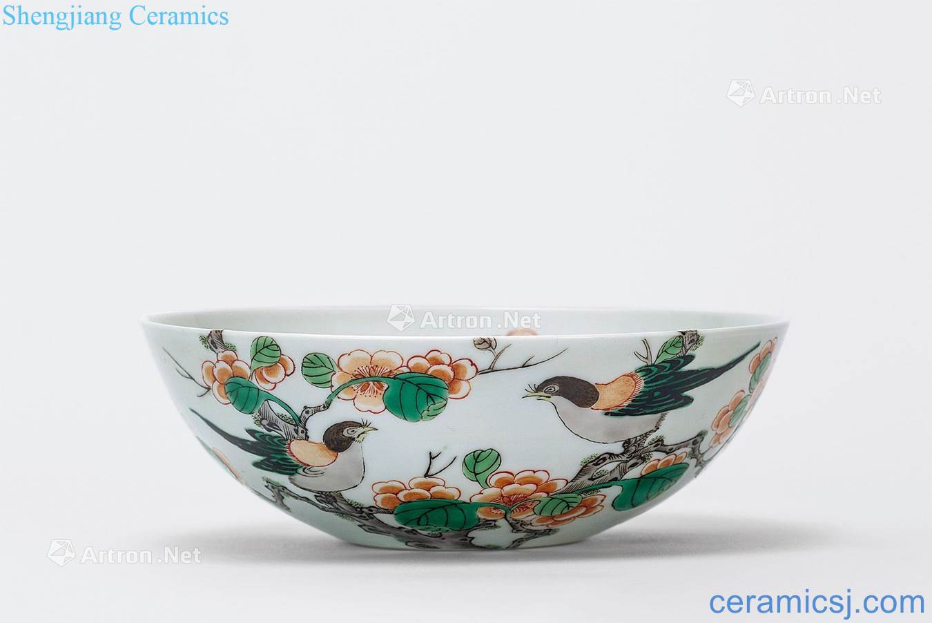 Clear colorful branches of flowers and birds lines lie the foot bowl