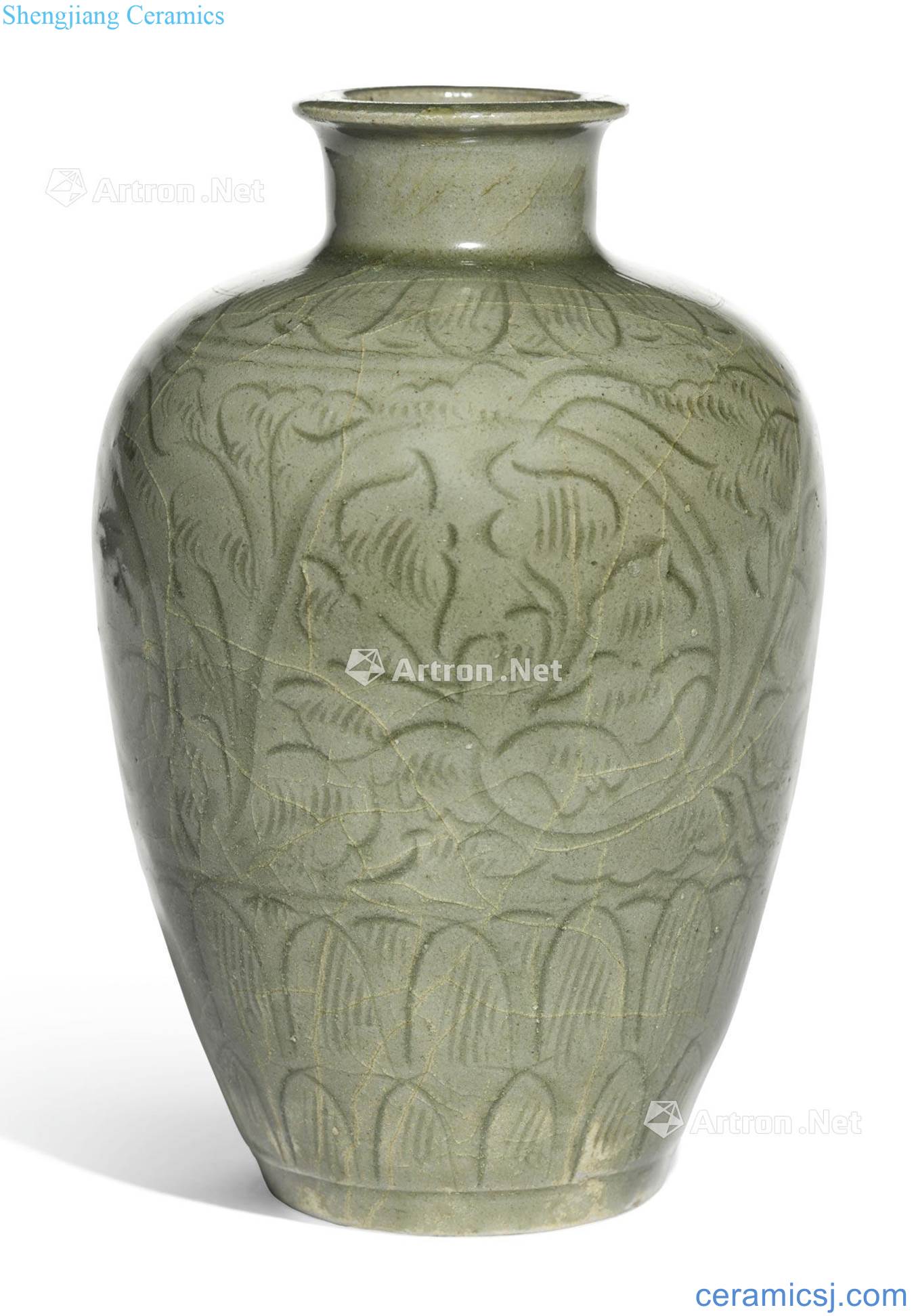 The early northern song dynasty Longquan celadon green glazed carved flower grain mei bottles around branches