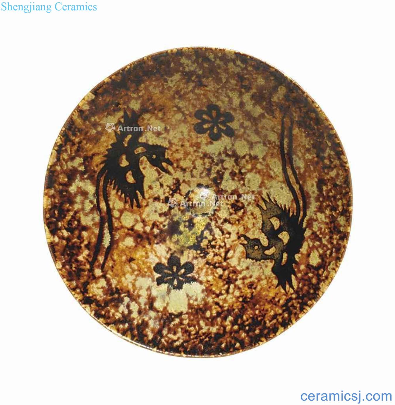 About A song dynasty JIZHOU "PHOENIX AND PRUNUS 'PAPER - CUT RESIST - DECORATED TEA BOWL