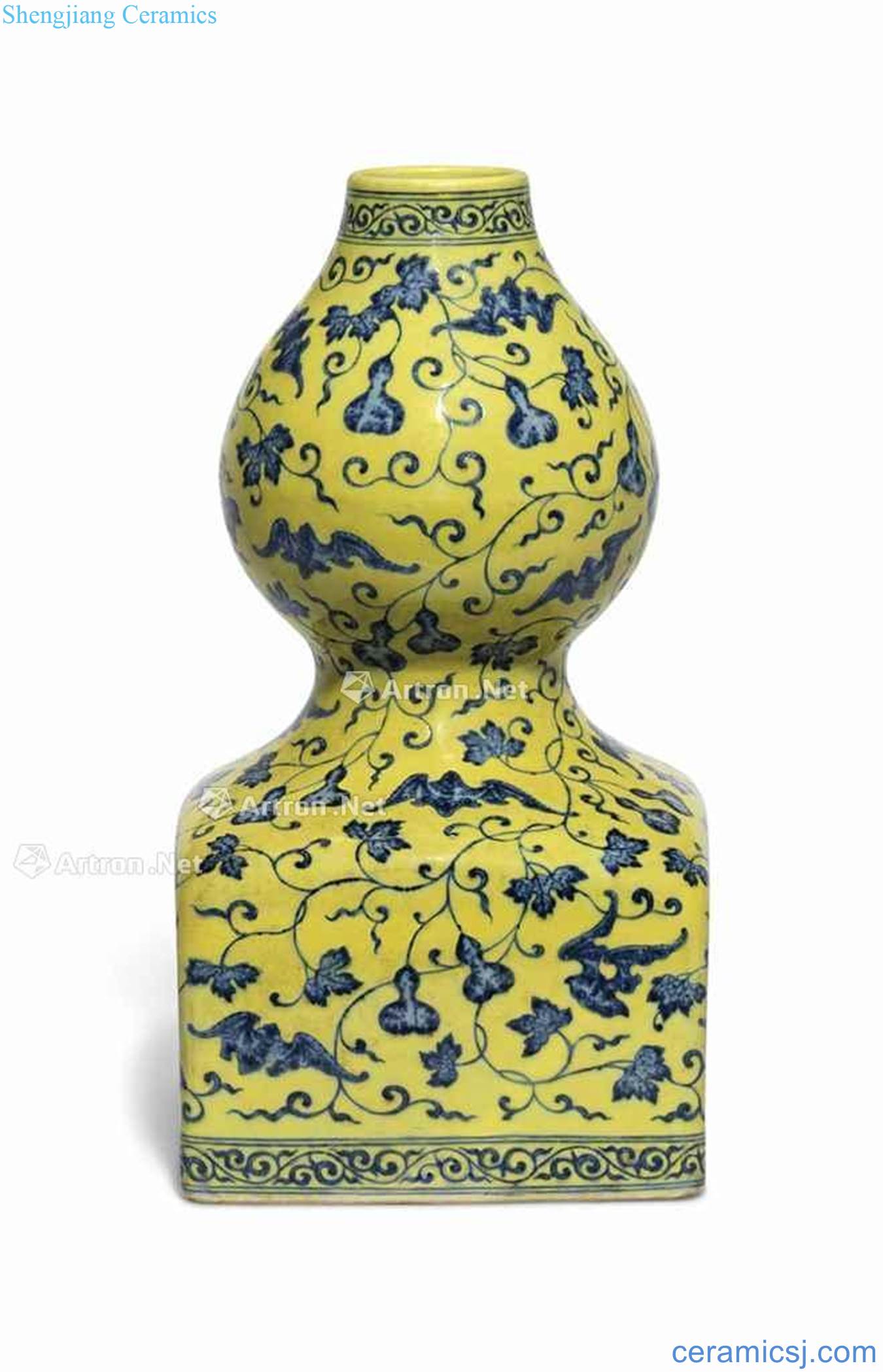 From 1736 to 1795 the AN UNDERGLAZE - BLUE AND YELLOW ENAMELLED DOUBLE GOURD VASE