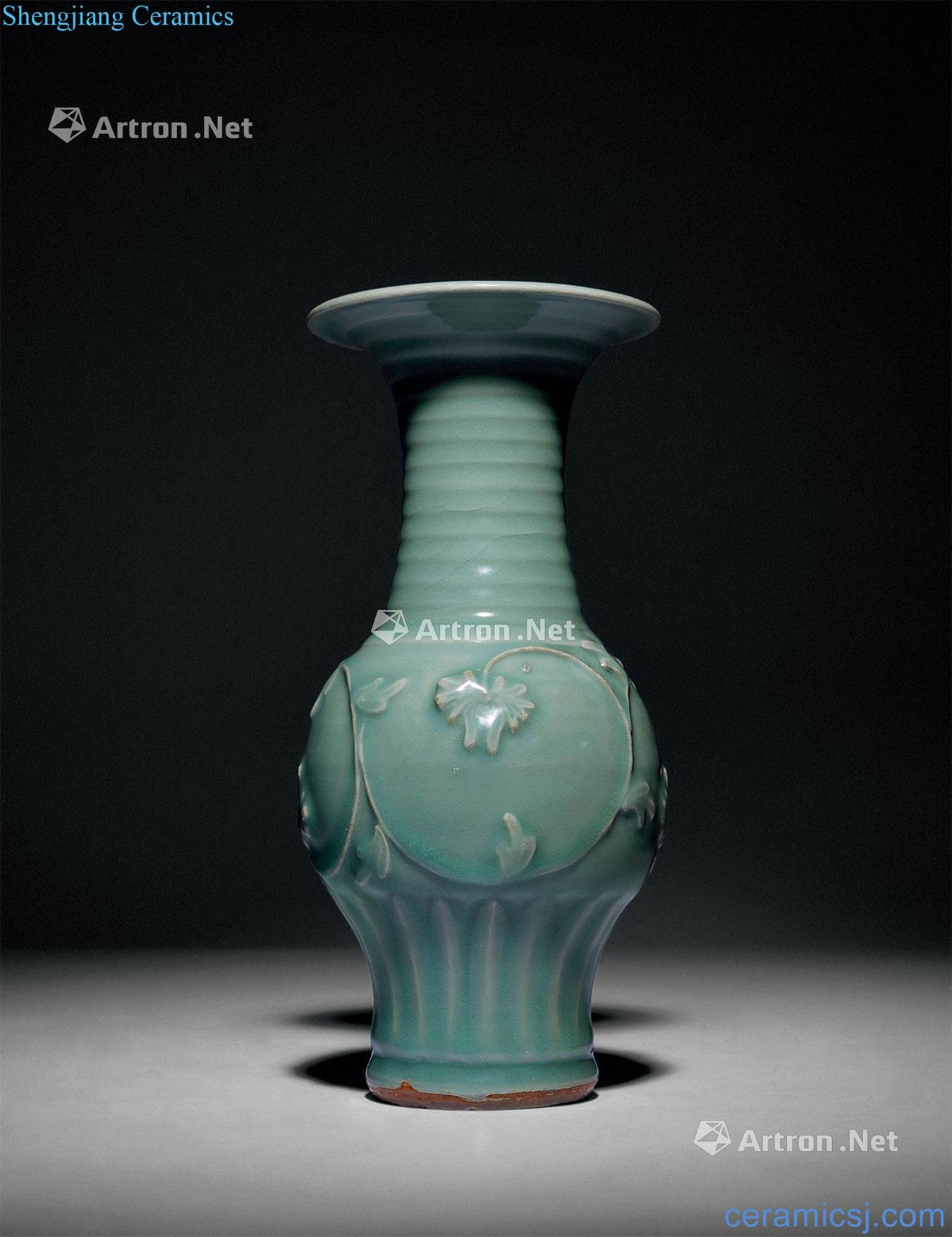 The southern song dynasty Longquan celadon hand-cut peony grains type bottle
