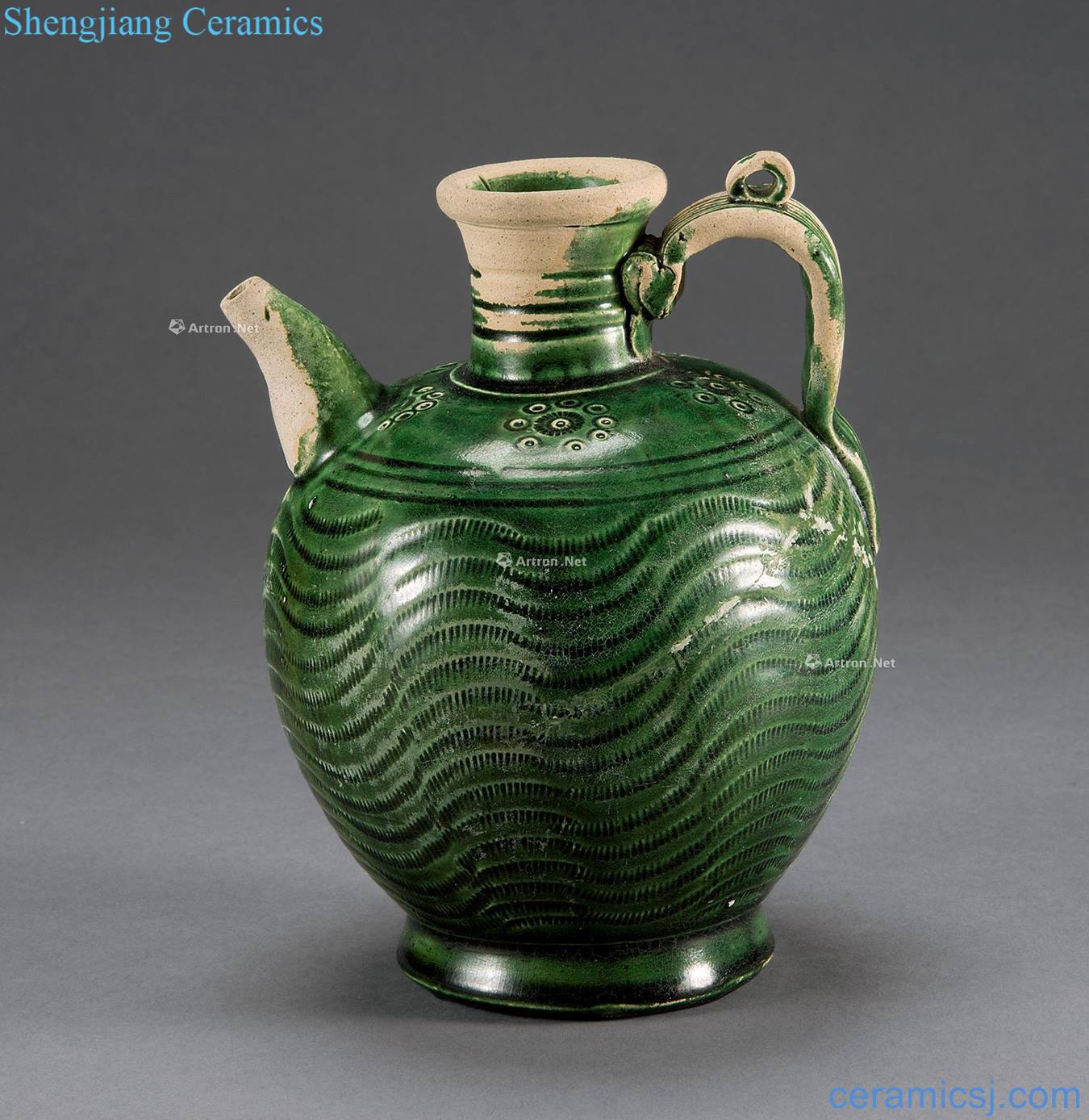 The song dynasty Henan county kiln green glaze water ripple ewer